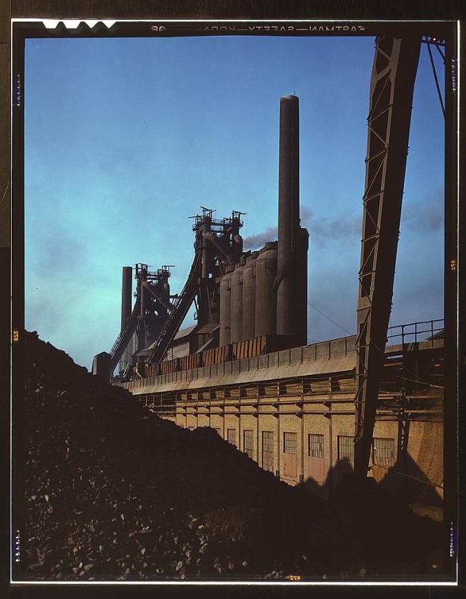 Blast furnaces and iron ore at the Carnegie-Illinois Steel Corporation mills, Etna, Pennsylvania - Photo from the Library of Congress, by Alfred T. Palmer; Reproduction #LC-DIG-fsac-1a35057 
